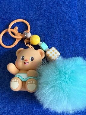 Used !!! Tan Bear Keychain with Aqua Pom Pom and Bead Accents